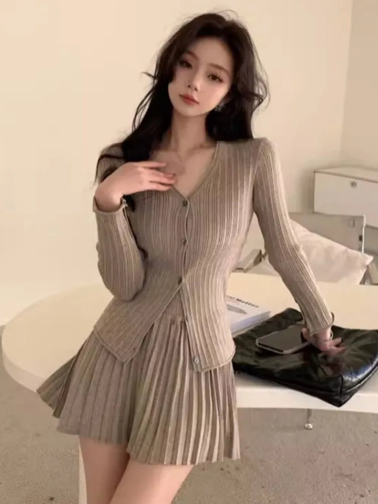 Conjunto de falda de punto de dos piezas Y2K de otoño, cárdigan liso de un solo pecho con cuello en V, minifalda plisada, traje elegante coreano, conjuntos de tejido