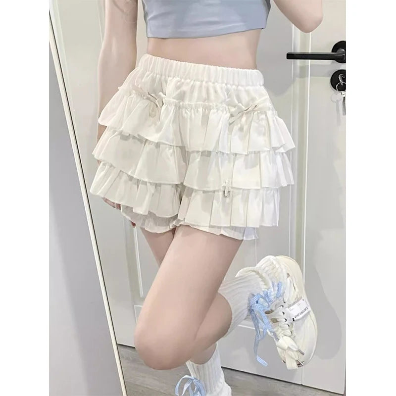 Minifalda con volantes Y2K para mujer, estilo kawaii, estilo lolita, con lazo, estilo harajuku, estilo japonés, de cintura alta, color rosa y blanco.
