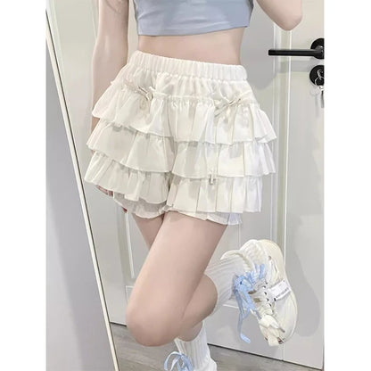 Minifalda con volantes Y2K para mujer, estilo kawaii, estilo lolita, con lazo, estilo harajuku, estilo japonés, de cintura alta, color rosa y blanco.