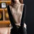 Suéter de punto de cuello alto para mujer, sin mangas, holgado, estilo occidental, versátil, para primavera y otoño