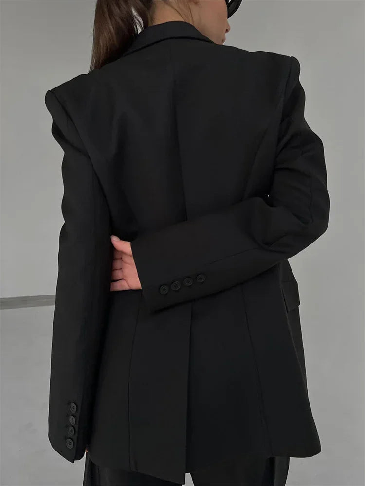 Traje de solapa negra para mujer, abrigo elegante de manga larga con bolsillos y retazos, blazer de cintura alta para otoño 2025