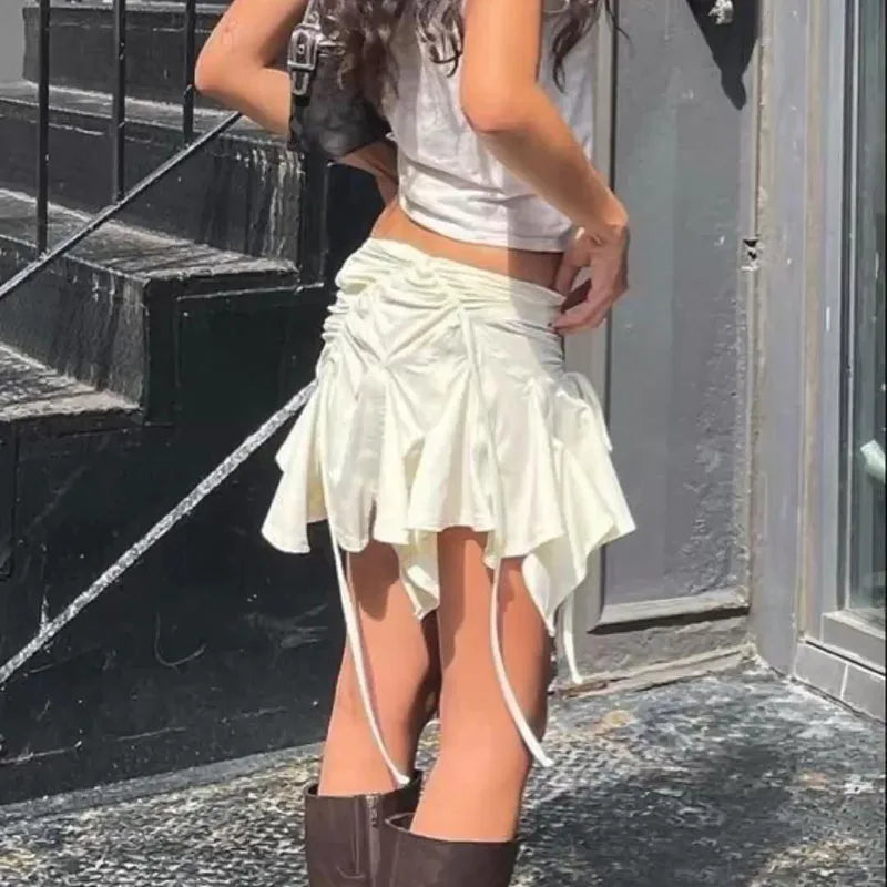 Falda plisada con dobladillo irregular Y2K para chica dulce, estilo retro de los años 00, fruncida, con lazo, de cintura baja, minifalda elegante para mujer, estilo ceñido y cruzado para club.