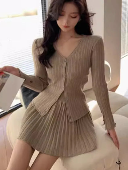 Conjunto de falda de punto de dos piezas Y2K de otoño, cárdigan liso de un solo pecho con cuello en V, minifalda plisada, traje elegante coreano, conjuntos de tejido