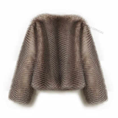 Abrigo de piel sintética corto de marca de lujo para mujer, icónico abrigo de piel sintética de invierno para la Semana de la Moda Callejera. Chaqueta corta y esponjosa para niñas.