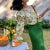 Blusa corta elegante con estampado floral de rosas para mujer, estilo coreano, de manga larga, con hombros descubiertos y mangas abullonadas, nueva
