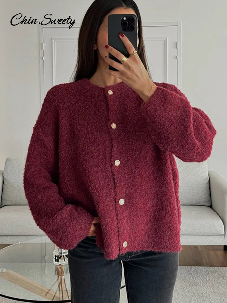 Suéter elegante de manga larga para mujer, cárdigan liso holgado de un solo pecho con cuello redondo, ropa de abrigo suave y a juego para primavera 2025.