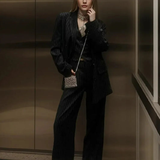 Blazer oversize de rayas negras de primavera para mujer, traje holgado con muescas y mangas largas, pantalones acampanados de cintura alta, camisetas sin mangas con cuello halter