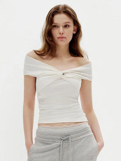 Camiseta con hombros descubiertos y fruncido para mujer, sexy, sin mangas, de color liso, ajustada, con cuello barco, estilo urbano