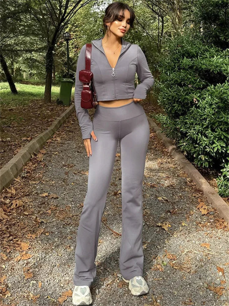 Conjunto informal de invierno de dos piezas con cárdigan de pierna recta y cremallera para mujer, y chándal ajustado de cintura alta con pantalones para mujer.