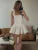 Vestido blanco con cuello halter para mujer, elegante, sin mangas, ajustado, corto, corte A, con parches, para playa y vacaciones.