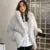 Abrigo de piel sintética de invierno para mujer, con capucha, holgado, de manga larga, chaqueta de piel de lujo de calle, abrigos de moda para mujer, nuevo