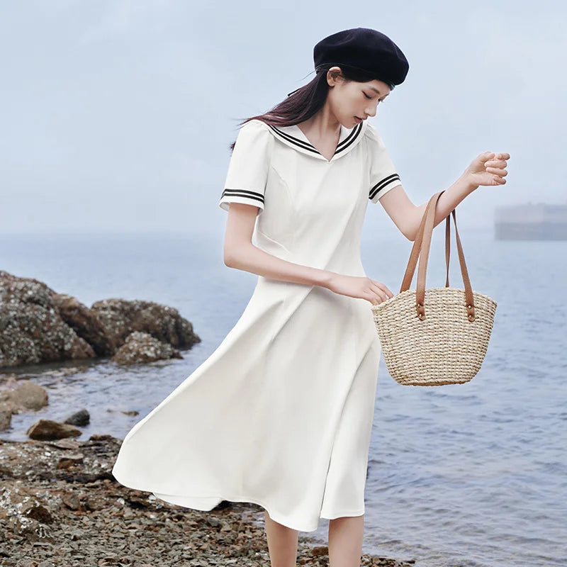 Vestido de mujer con cuello azul marino y estilo universitario y artístico, nuevo vestido de verano blanco con luz de luna y cintura ceñida.