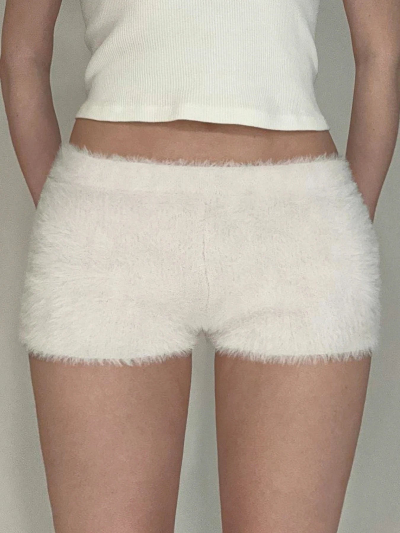 Pantalones cortos de piel sintética, suaves, sencillos y modernos para mujer, a la moda, elegantes, cálidos y lisos.