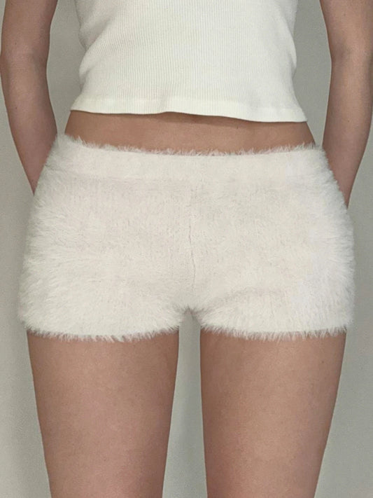 Pantalones cortos de piel sintética, suaves, sencillos y modernos para mujer, a la moda, elegantes, cálidos y lisos.