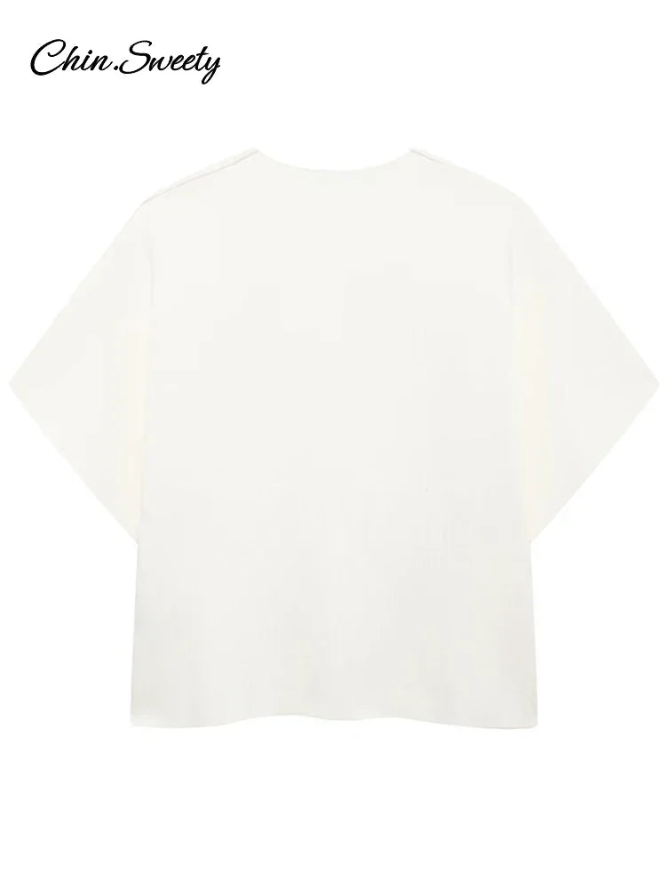 Chaleco de punto de moda para mujer, manga corta, cuello en V, botones, holgado, blanco, tipo cárdigan, otoño, novedad en prendas exteriores.