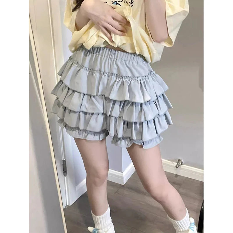 Minifalda con volantes Y2K para mujer, estilo kawaii, estilo lolita, con lazo, estilo harajuku, estilo japonés, de cintura alta, color rosa y blanco.