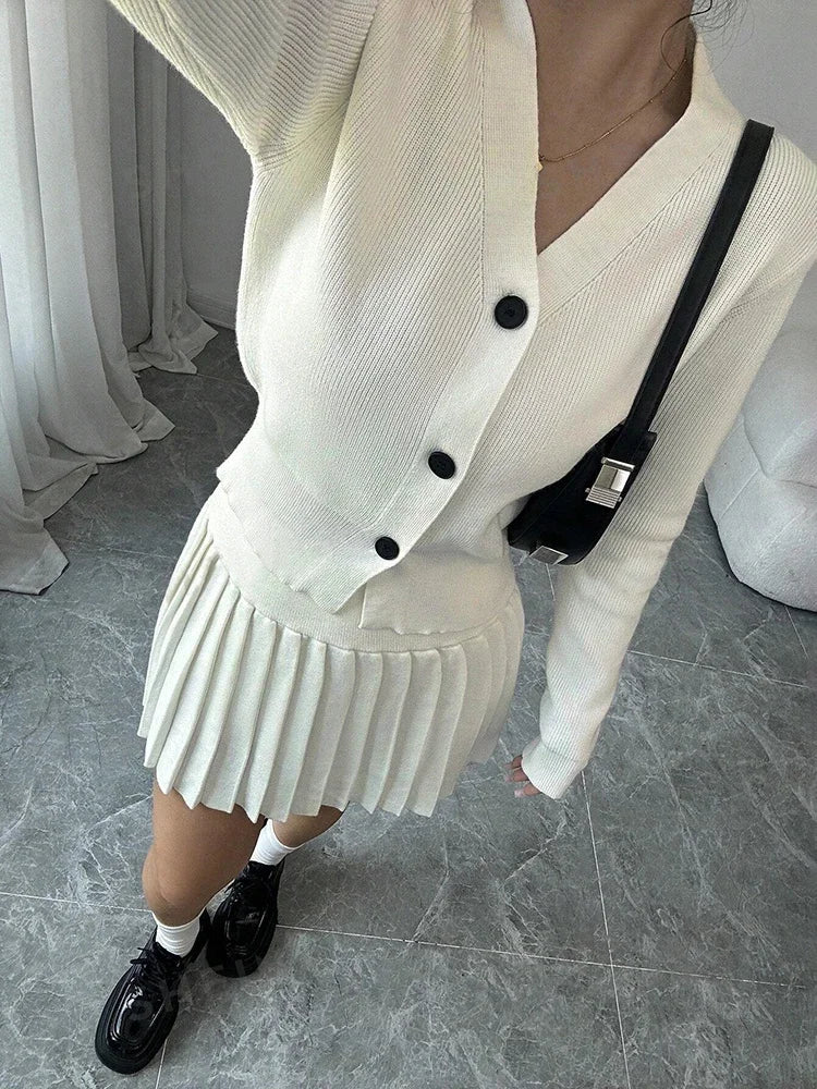 Conjunto de dos piezas de suéter de punto retro de manga larga con falda plisada de cintura alta para mujer, conjuntos sólidos a juego de nicho, otoño nuevo