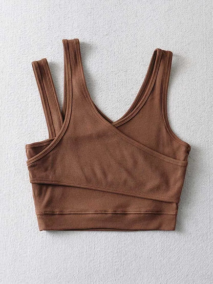 Camisola sexy de punto liso, corta, ahuecada, sin mangas