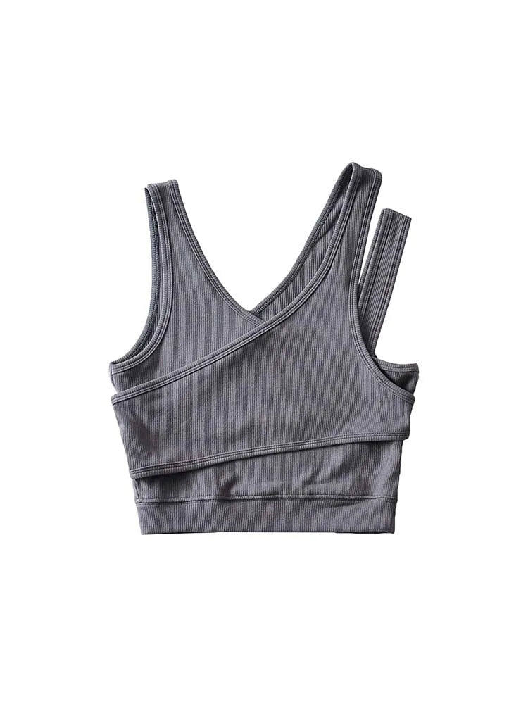 Camisola sexy de punto liso, corta, ahuecada, sin mangas