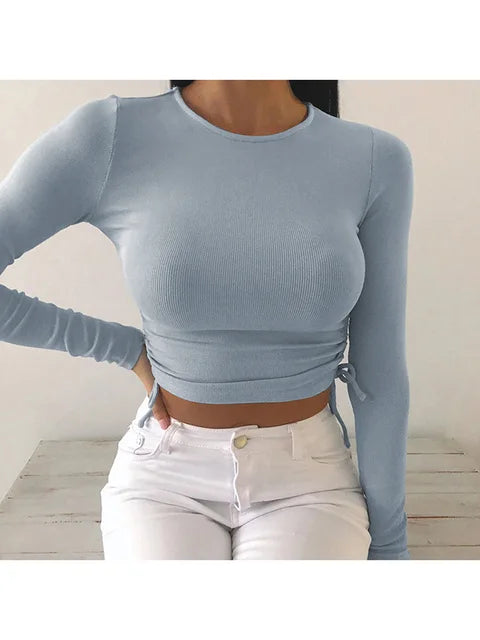Camiseta sexy de manga larga con cuello redondo y corte ajustado para mujer, otoño 2025, de punto liso con vendaje irregular y cordón ajustable