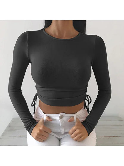 Camiseta sexy de manga larga con cuello redondo y corte ajustado para mujer, otoño 2025, de punto liso con vendaje irregular y cordón ajustable