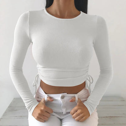 Camiseta sexy de manga larga con cuello redondo y corte ajustado para mujer, otoño 2025, de punto liso con vendaje irregular y cordón ajustable