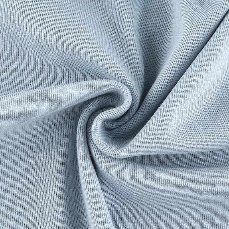 Camiseta sexy de manga larga con cuello redondo y corte ajustado para mujer, otoño 2025, de punto liso con vendaje irregular y cordón ajustable