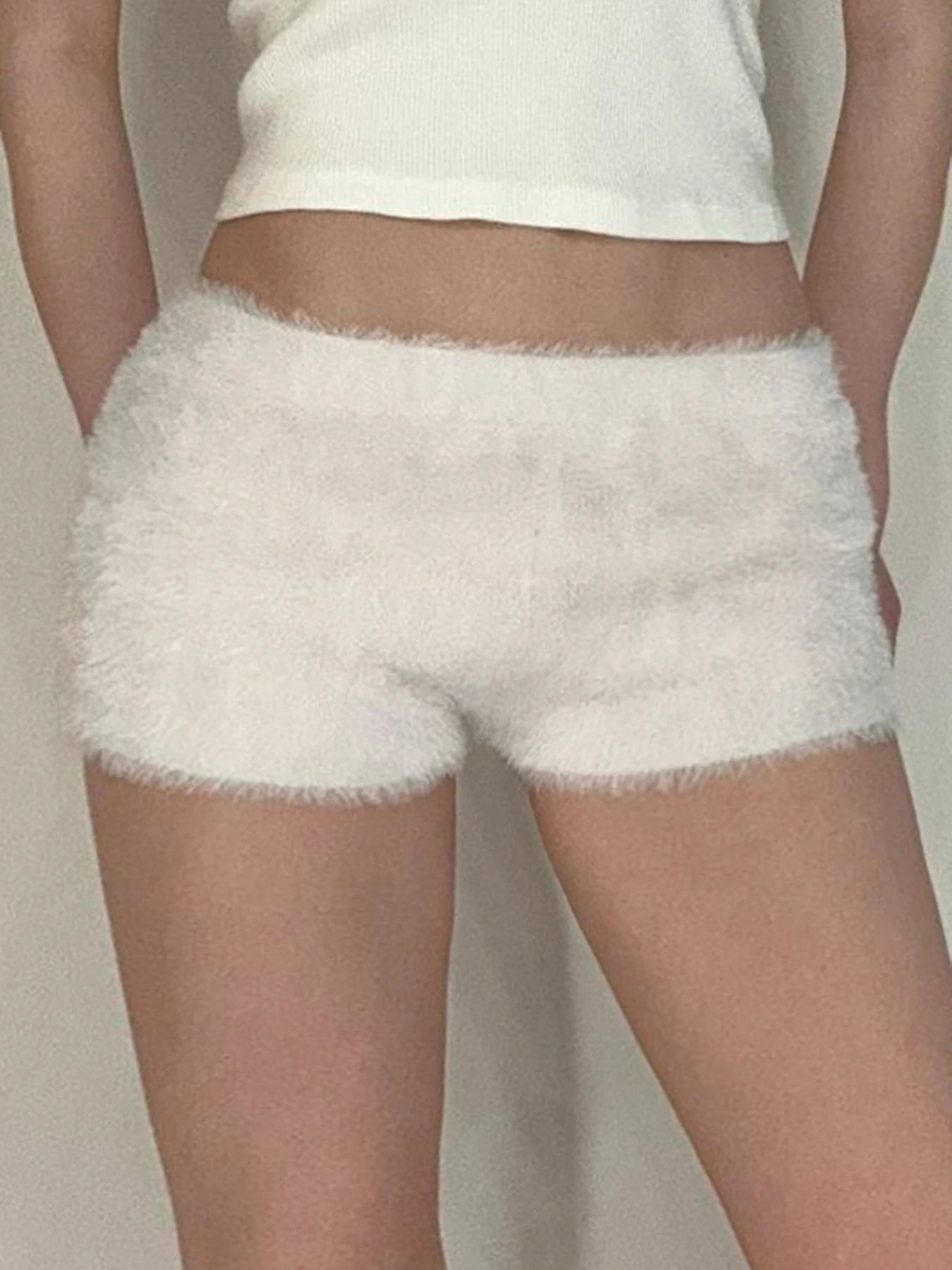 Pantalones cortos de piel sintética, suaves, sencillos y modernos para mujer, a la moda, elegantes, cálidos y lisos.