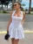 Vestido blanco con cuello halter para mujer, elegante, sin mangas, ajustado, corto, corte A, con parches, para playa y vacaciones.