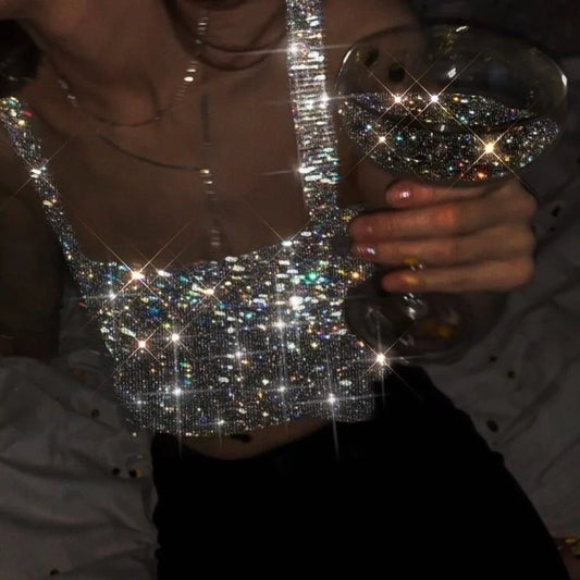 Camiseta sin mangas de malla metálica con diamantes de imitación para mujer, top corto con cadena hueca en la espalda, chaleco sexy para playa y fiesta en club.