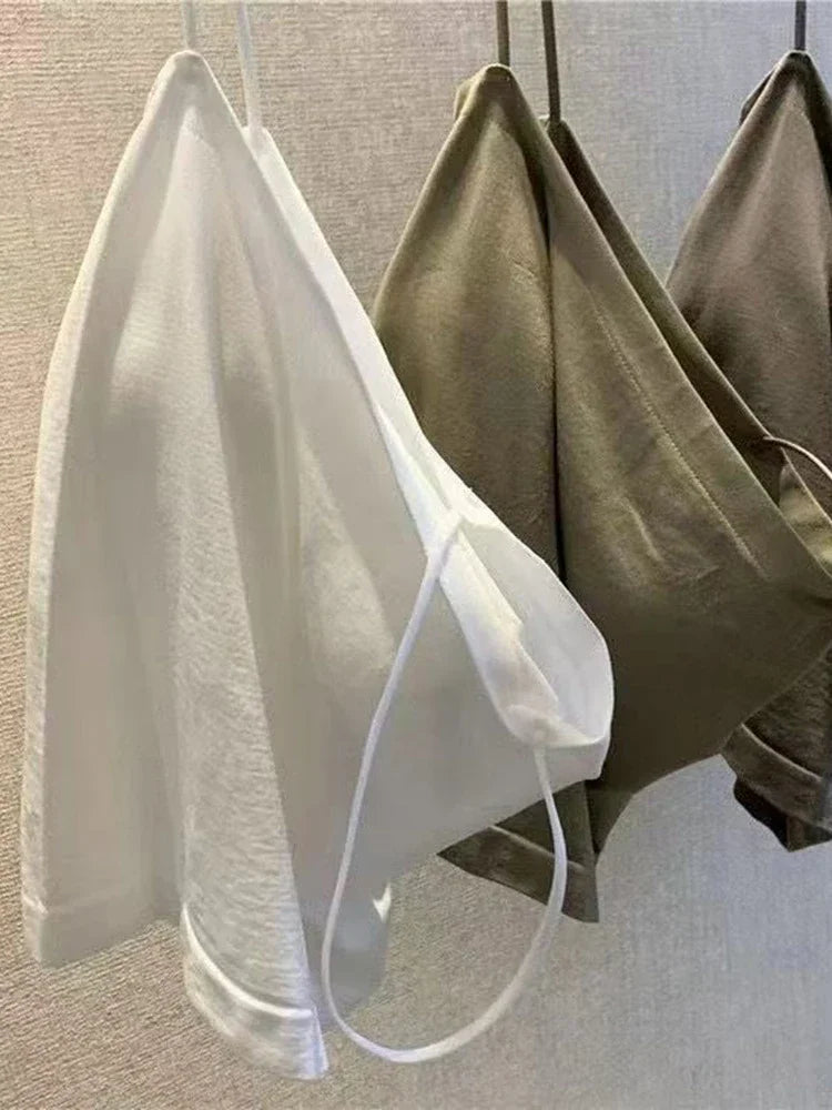 Top básico de tirantes finos, top blanco de verano para mujer 2025, camisola ajustada sin espalda, sin mangas, top bandeau corto