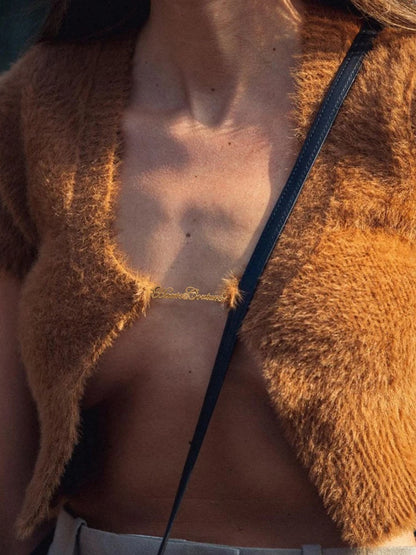Cárdigan corto elegante, suéter de manga corta de punto de mohair, camisetas sin mangas con letras y cadena para mujer, novedad 2025