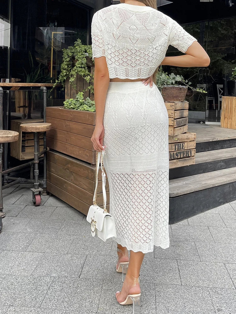 Conjunto de camiseta y falda de punto blanco de manga corta con aberturas transparentes de cintura alta, sexy, ajustado, cruzado en la cadera, conjuntos de dos piezas para mujer