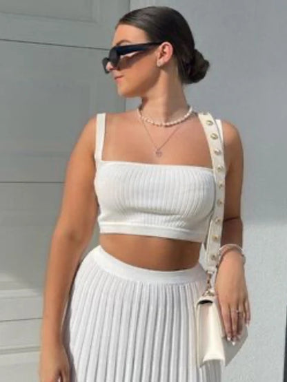 Nuevos conjuntos de dos piezas de punto blanco para mujer, top de tirantes acanalado y falda de punto plisada, conjuntos de vestido largo de verano para mujer.