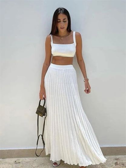 Nuevos conjuntos de dos piezas de punto blanco para mujer, top de tirantes acanalado y falda de punto plisada, conjuntos de vestido largo de verano para mujer.