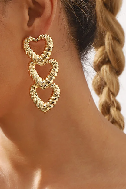 Pendientes de metal con forma de corazón 