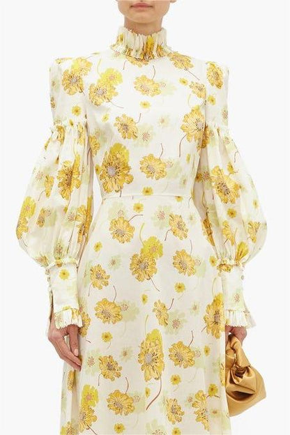 Vestido largo con cuello alto y mangas farol con estampado floral 