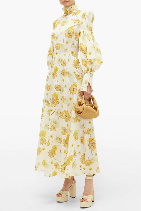 Vestido largo con cuello alto y mangas farol con estampado floral 