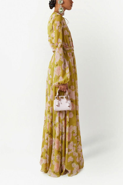 Vestido largo con mangas abullonadas y encaje floral 