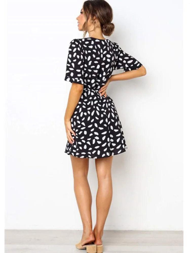 Minivestido de verano con estampado de lunares blancos para mujer, cuello en V, informal, para playa, sexy, cruzado con botones, ajustado