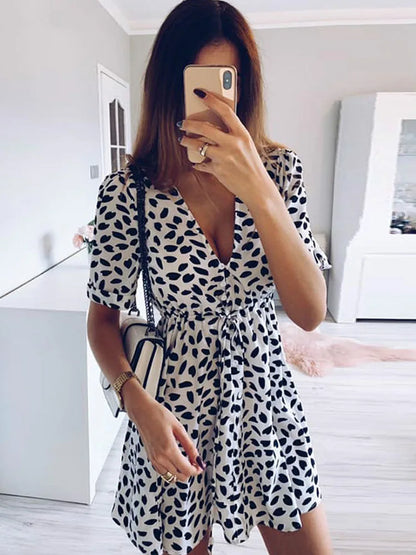 Minivestido de verano con estampado de lunares blancos para mujer, cuello en V, informal, para playa, sexy, cruzado con botones, ajustado