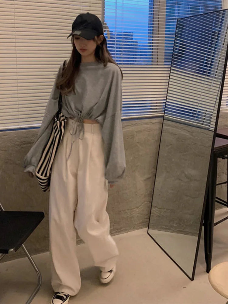 Camisetas de manga larga para mujer, top corto liso a la moda, suave, holgado, con cordón ajustable, cuello redondo, básicas y a la moda para uso diario.