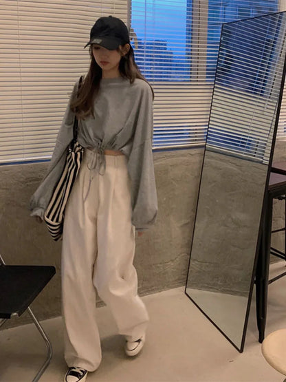 Camisetas de manga larga para mujer, top corto liso a la moda, suave, holgado, con cordón ajustable, cuello redondo, básicas y a la moda para uso diario.