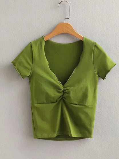 Camiseta ajustada suave y elástica con cuello en V para mujer con costura bajo el busto