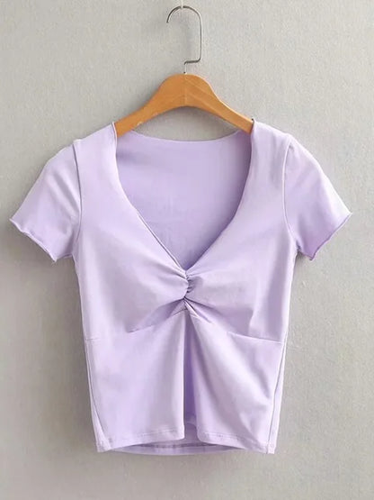 Camiseta ajustada suave y elástica con cuello en V para mujer con costura bajo el busto