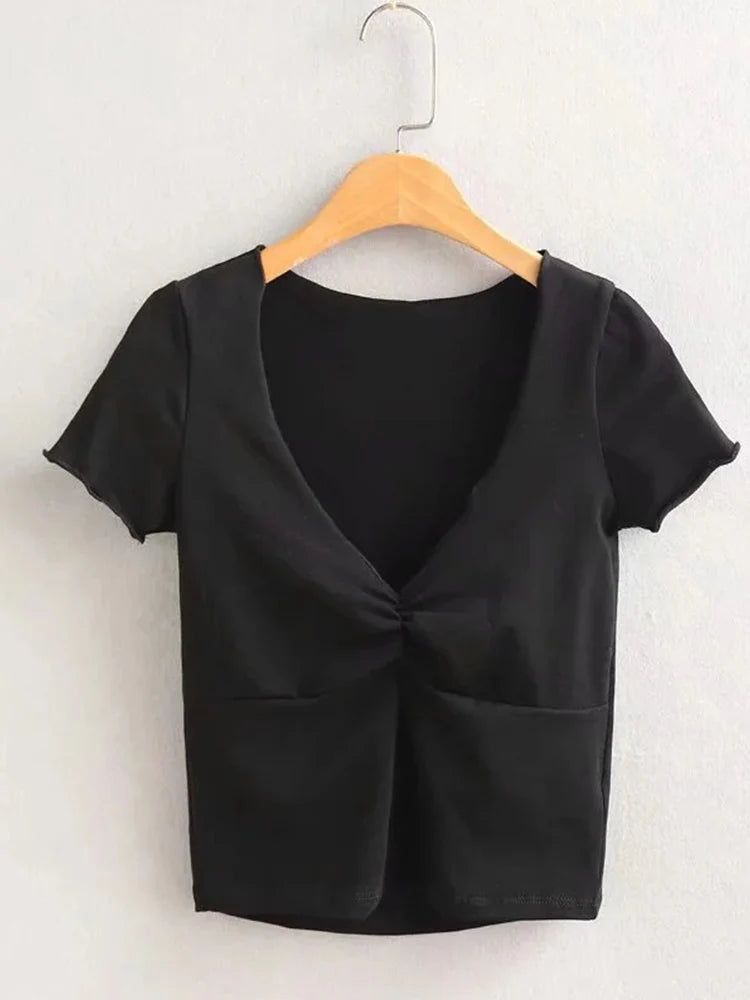 Camiseta ajustada suave y elástica con cuello en V para mujer con costura bajo el busto
