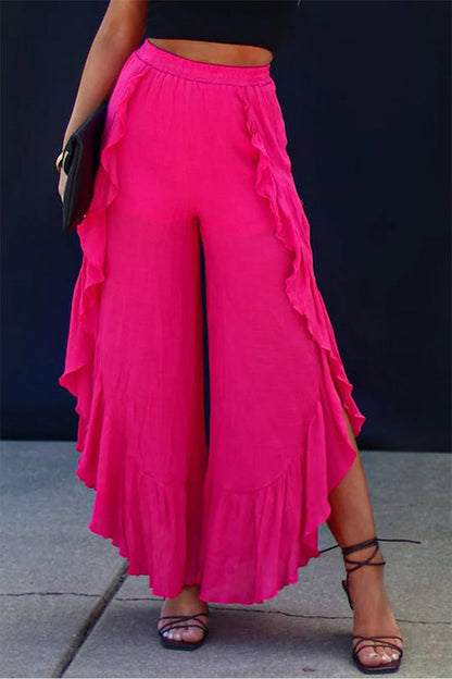 Pantalones anchos de cintura alta con abertura y volantes de rosas