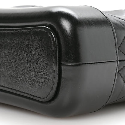 Aged Calfskin Quilted Small Gabrielle Logo Hobo Black