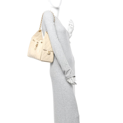 Caviar Quilted Small Chanel 25 Handbag Beige