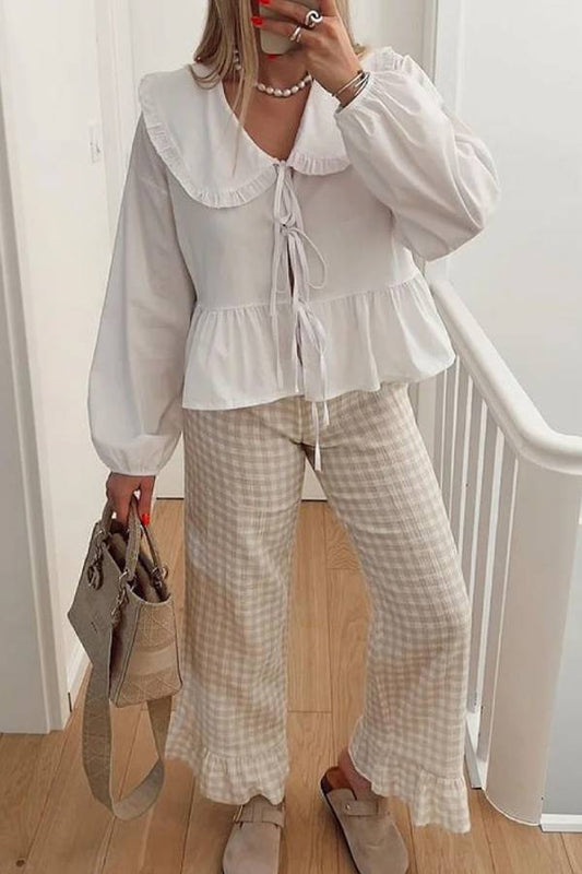 Camisa tipo cárdigan de manga larga con cordones en color liso